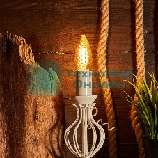 Лампа светодиодная филаментная Rexant Витая свеча LCW35 7.5 Вт 600 Лм 2400K E14 золотистая колба