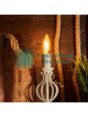 Лампа светодиодная филаментная Rexant Витая свеча LCW35 7.5 Вт 600 Лм 2400K E14 золотистая колба